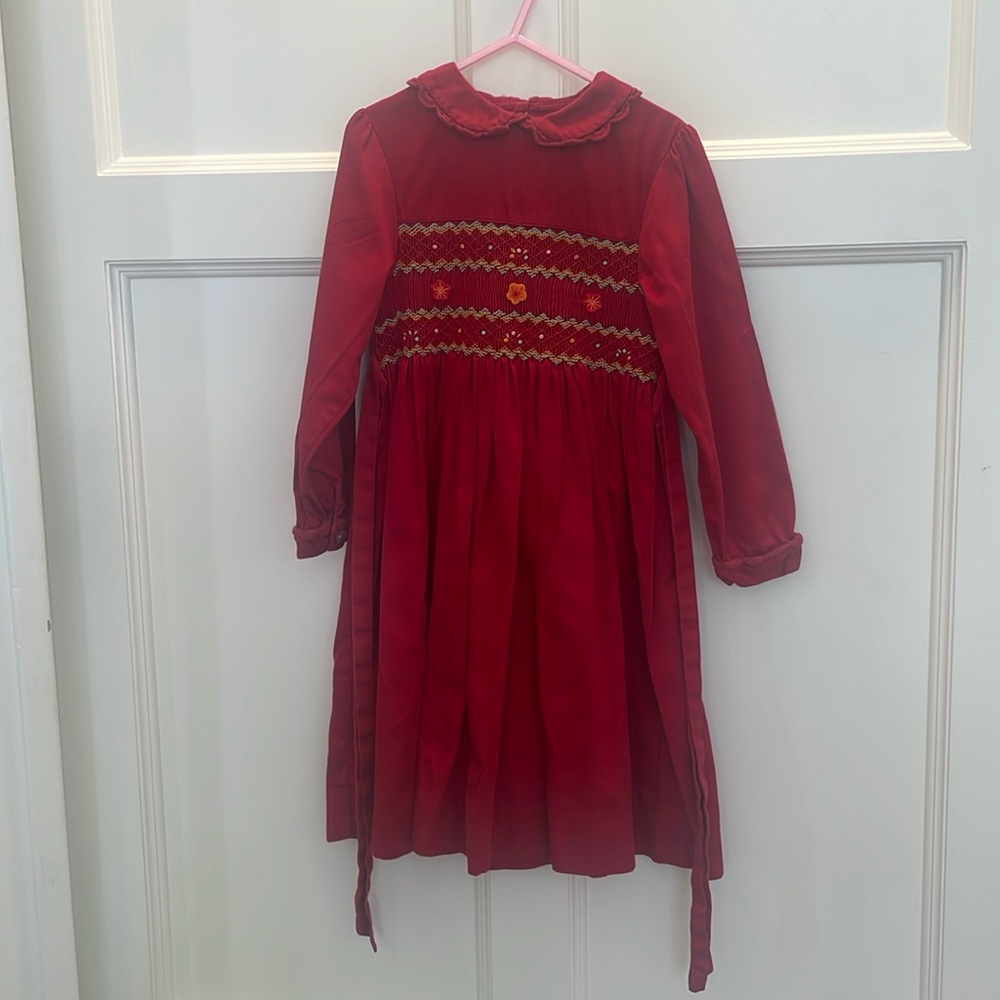 Cute red dress long sleeves. Girls size 6 jacqui.